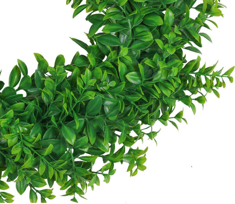 U'Artlines artificial greenery wreath hanging on wall or door.