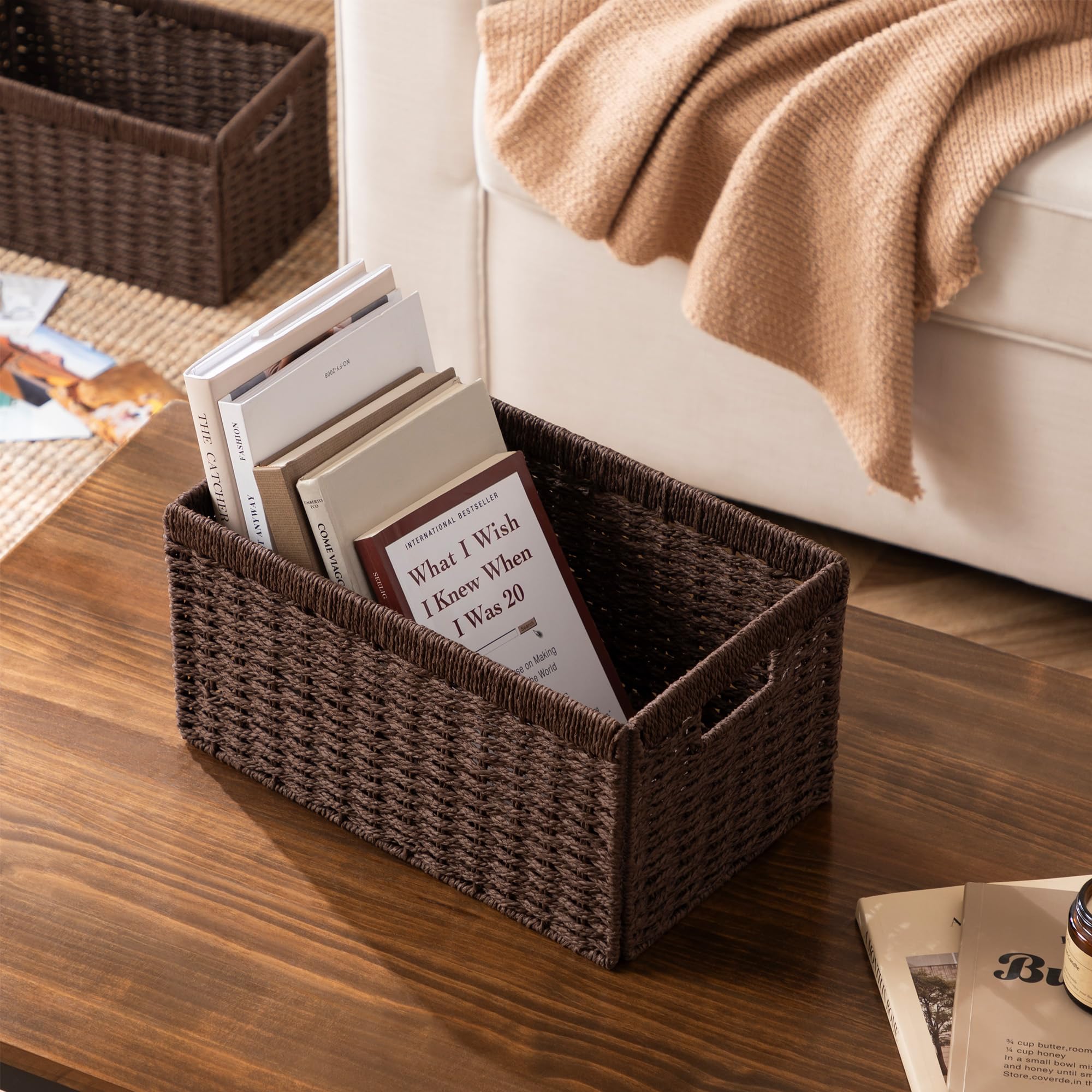 UBBCARE wicker basket filled with blankets on a living room shelf
