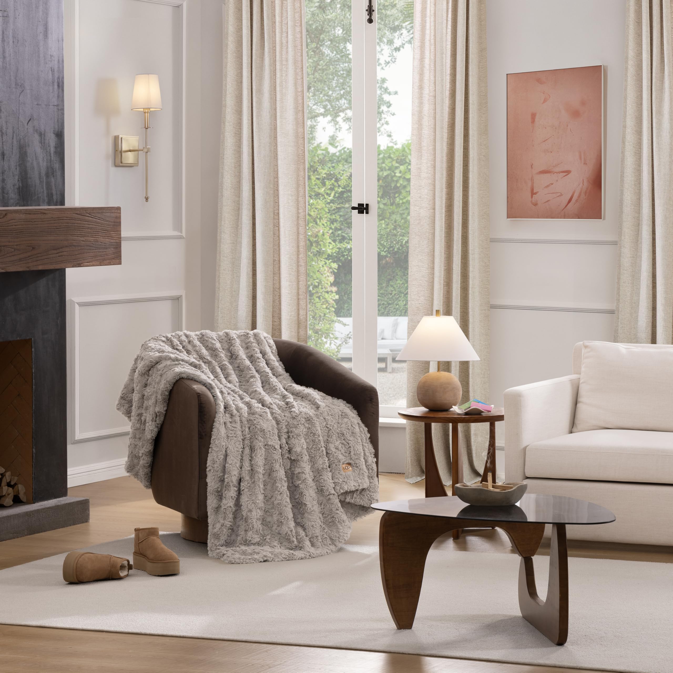 UGG Adalee throw decorates bed for soft, inviting bedroom ambience