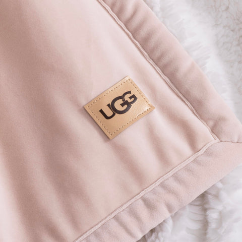 UGG Bliss Throw Blanket machine washable for easy care.
