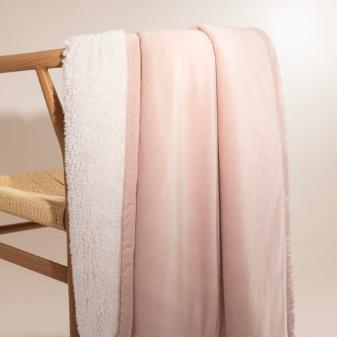 UGG Bliss Throw Blanket quartz pink color adds gentle accent to spaces.