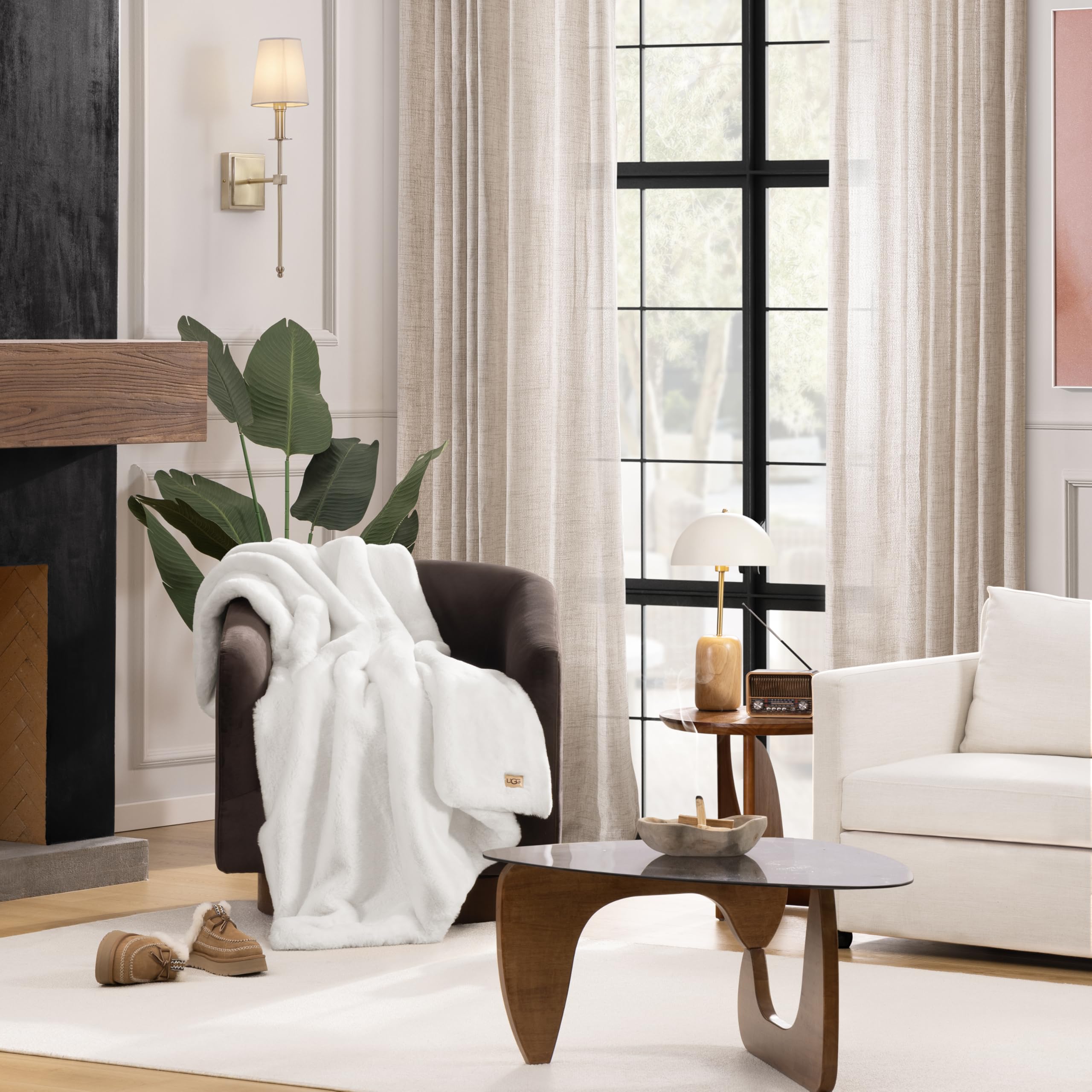 UGG Euphoria plush faux fur throw back view shows soft backing for cozy seating