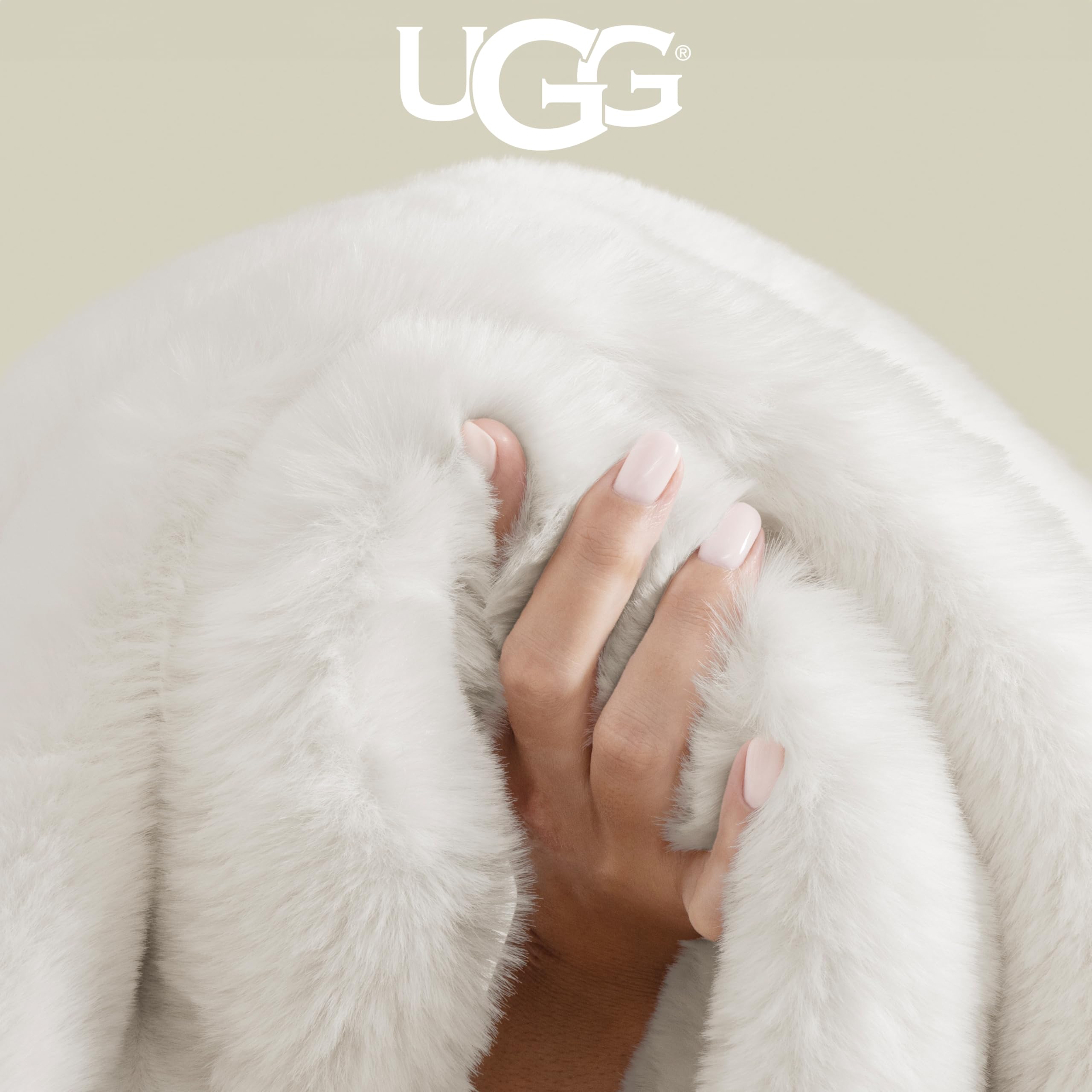UGG Euphoria plush fur throw on couch demonstrates quick comfort during chilly evenings
