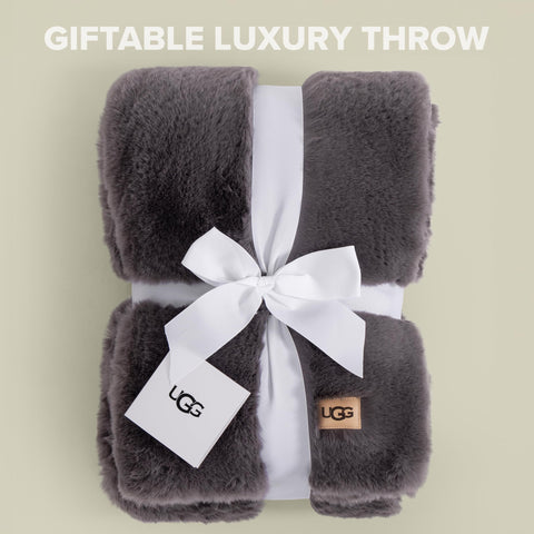 UGG Euphoria throw 50x70 inch size enhances couch layering and comfort.