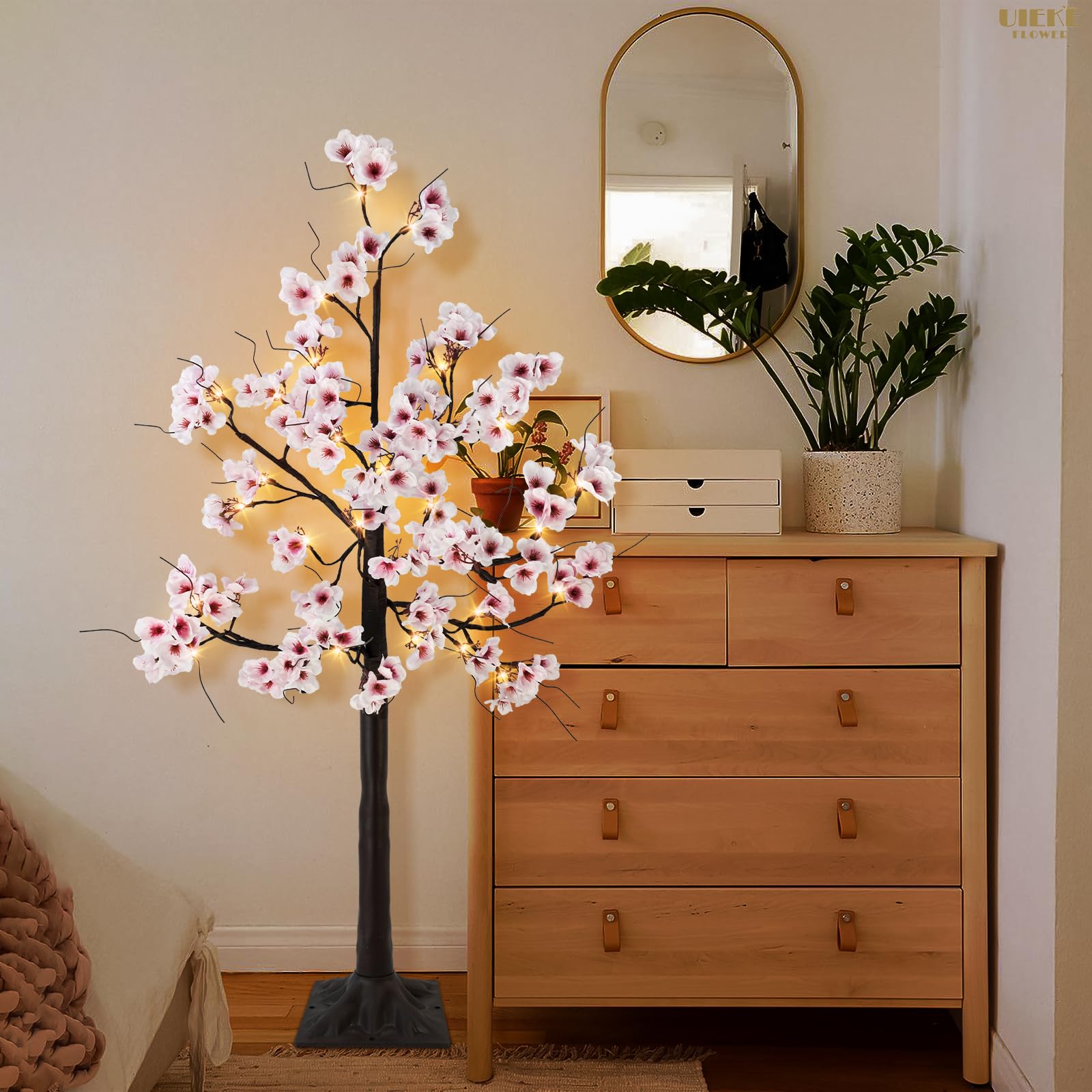 Uieke Cherry Blossom Tree includes ground stakes for stable outdoor installation.