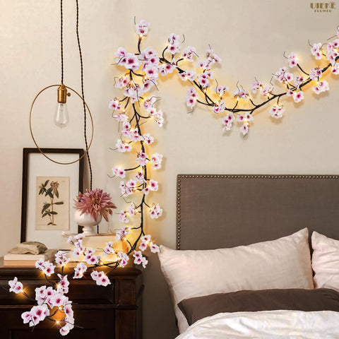 Uieke mantel and fireplace decor adds delicate floral charm to living spaces.