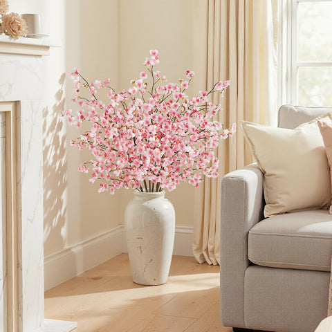 Three-pack Uieke silk branches for versatile, reusable floral accents.