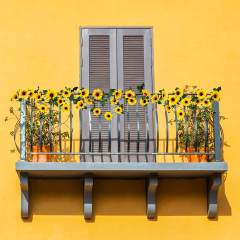 Uieke silk sunflowers with green leaves add timeless home décor