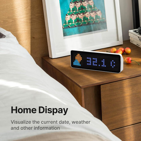 ULANZI TC001 weather display provides ambient time-weather context beside your bed.