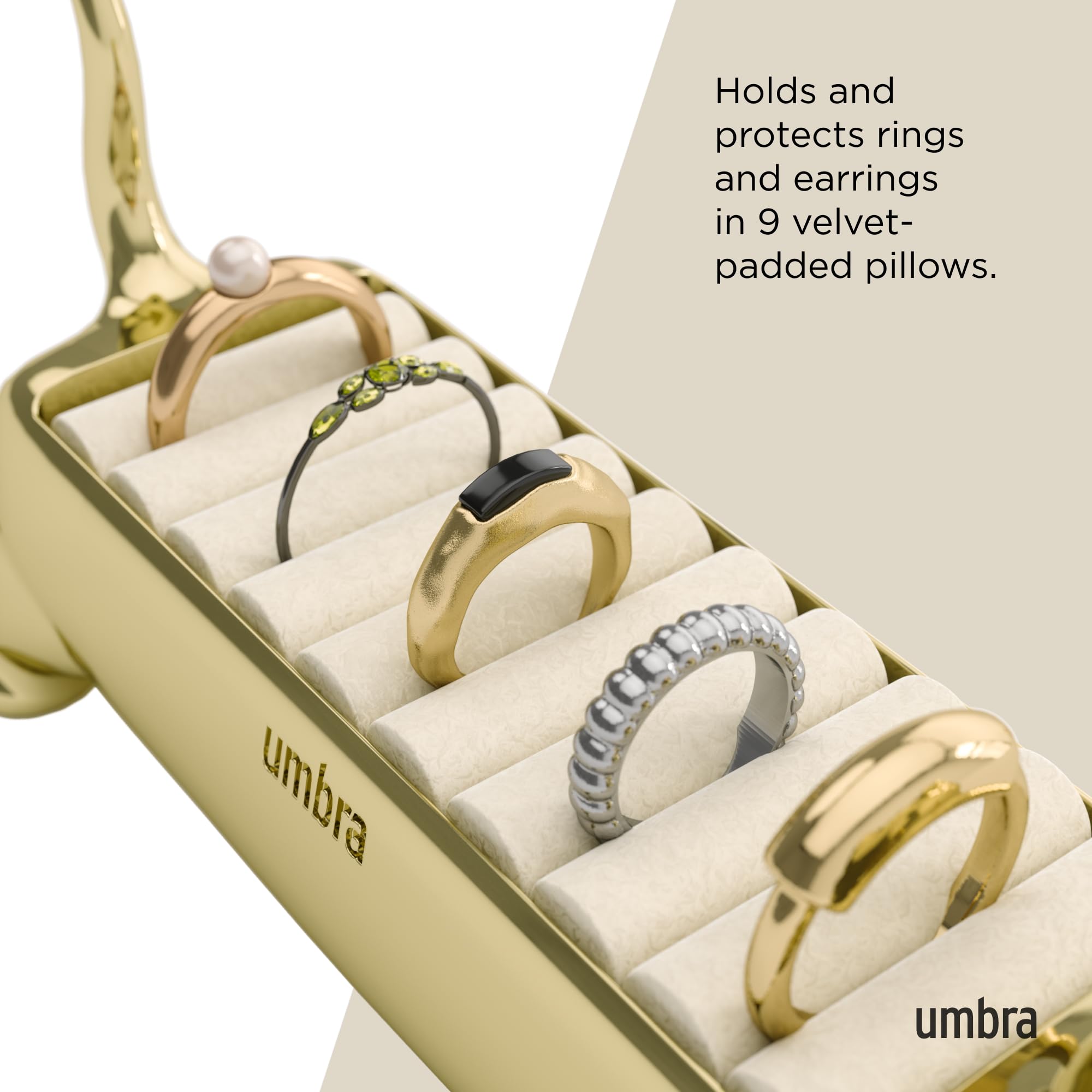 Umbra Ali Cat ring holder displayed on nightstand for quick access.