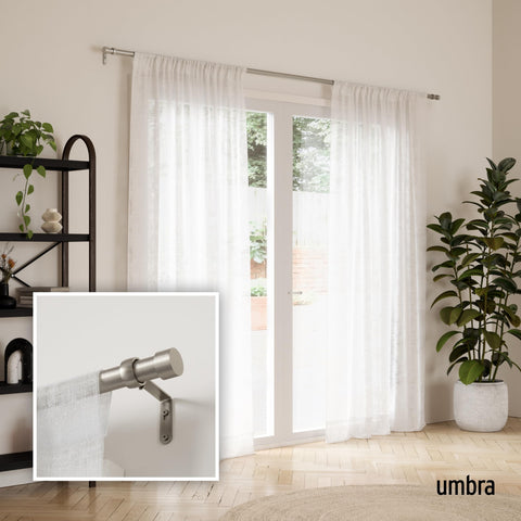 Umbra Cappa nickel finials add a polished touch to any curtain setup.