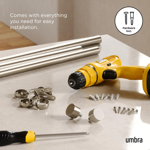 Telescoping Umbra Cappa rod adjusts to fit your window width precisely.