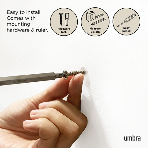 Umbra Flip in a dorm room showcases versatile space-saving storage.