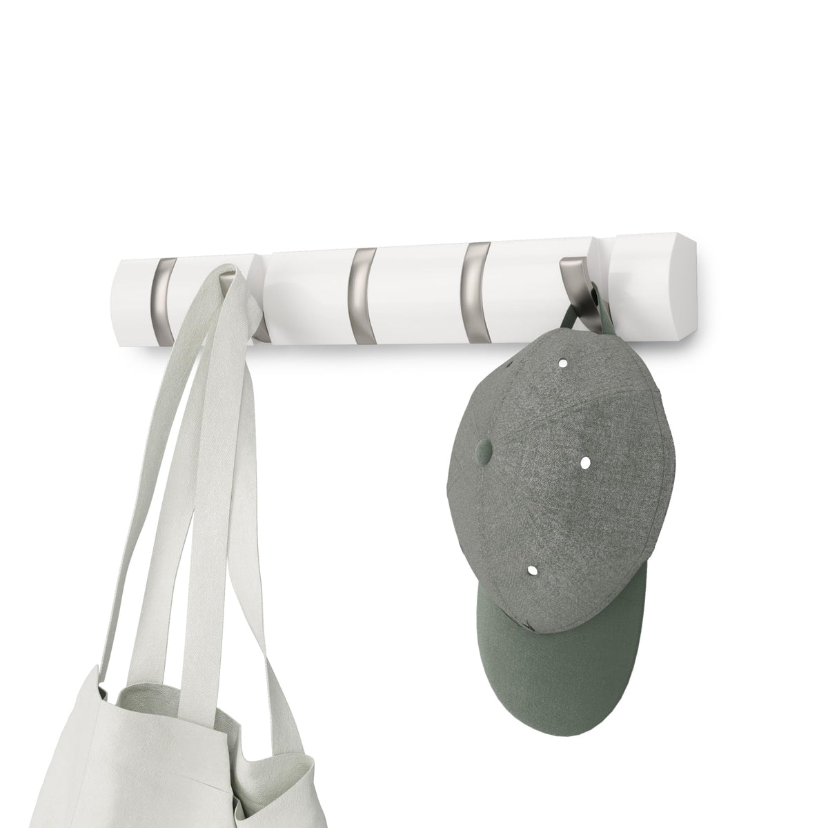 Umbra Flip wall-mounted coat rack with extended hooks for organized coats and bags.