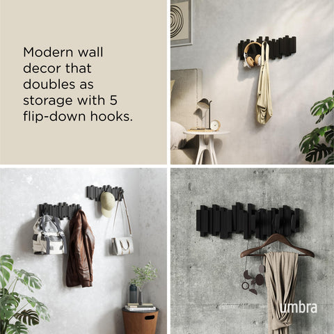 Umbra Sticks black finish detail highlights modern, sculptural design.
