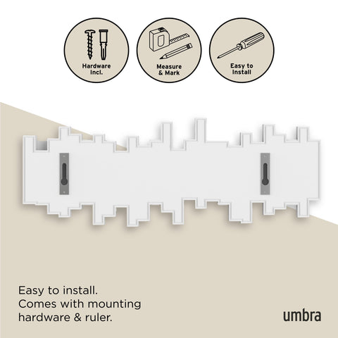 Umbra Sticks entryway setup blends decor with practical organization.