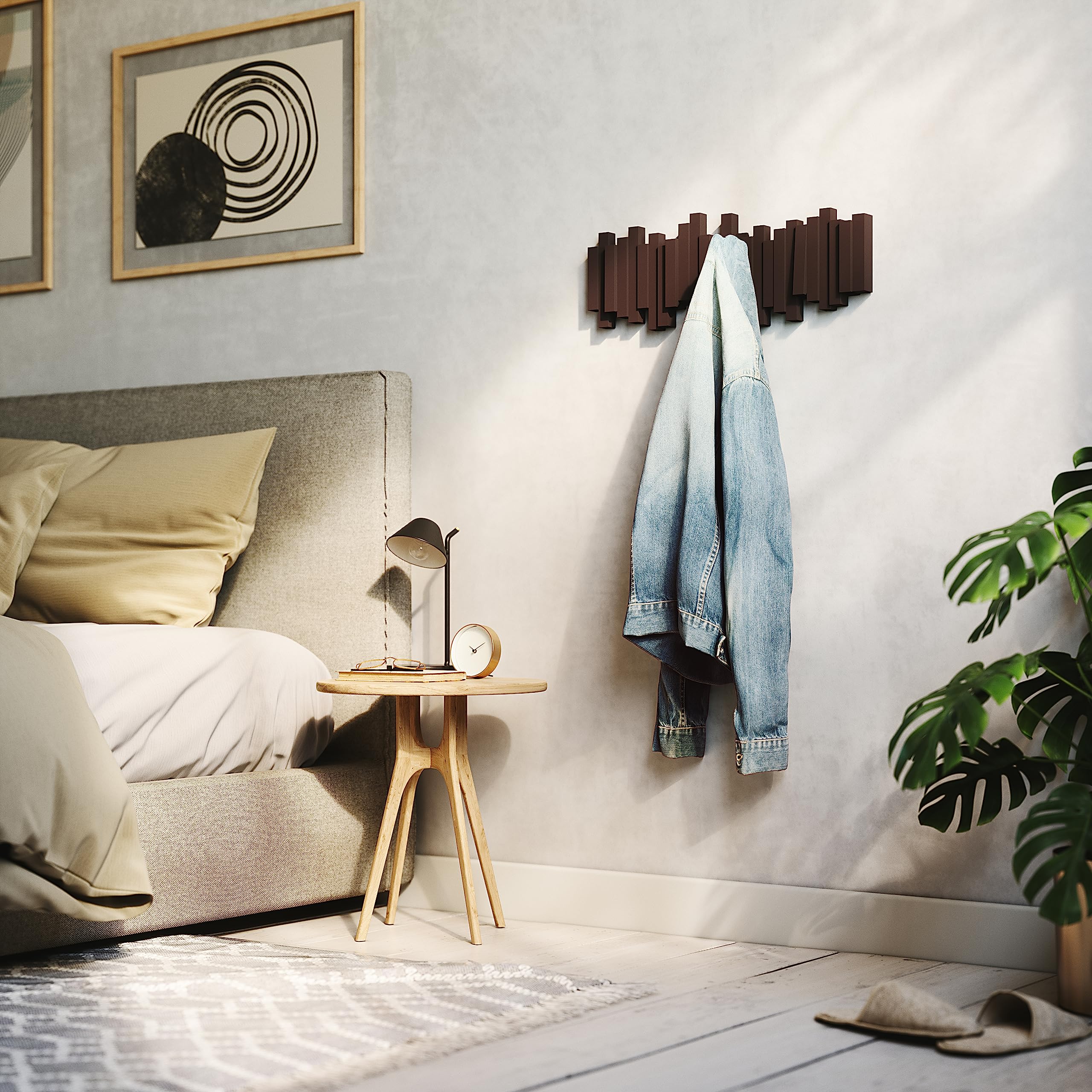 Umbra Sticks espresso versatile storage solution for coats and accessories.