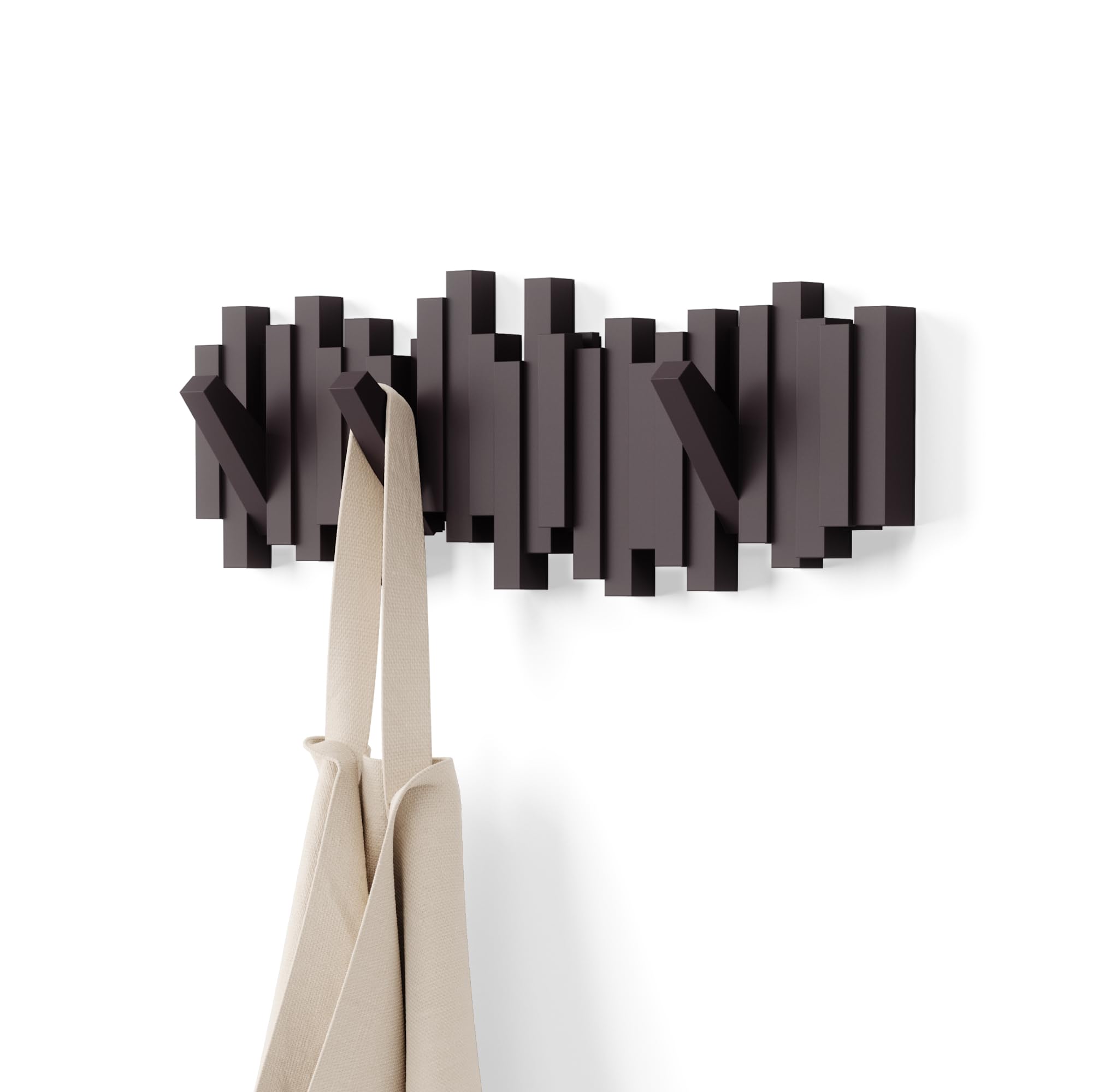 Umbra Sticks espresso wall-mounted coat rack with retractable pegs for space-saving organization.
