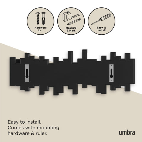 Umbra Sticks wall display blends art and organization in black.