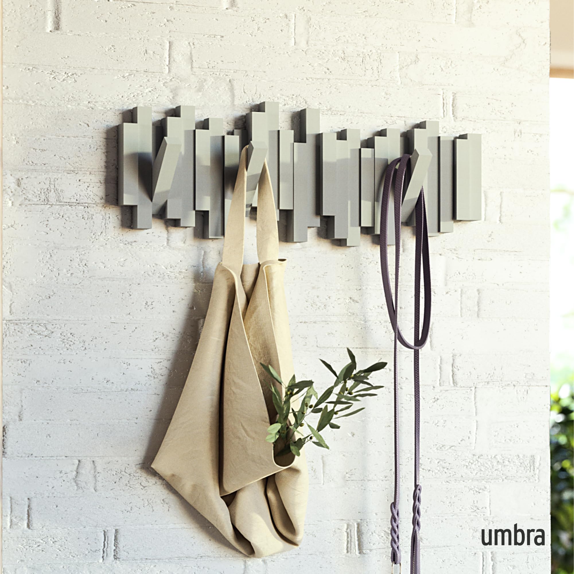 Umbra Sticks sculptural design doubles as wall art while organizing essentials.