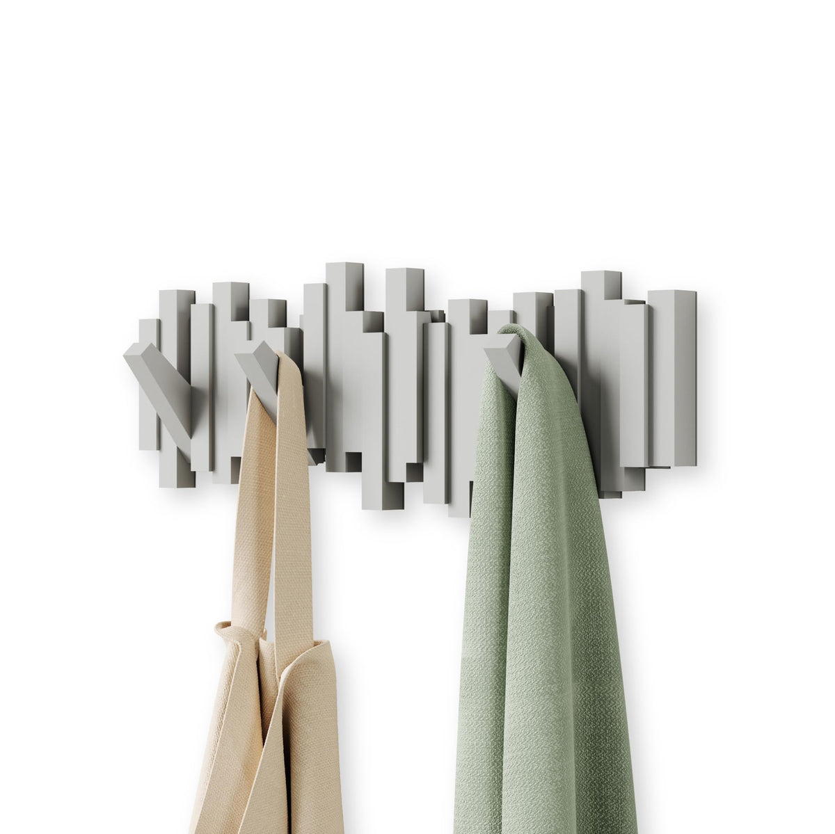 Umbra Sticks wall-mount rack with five retractable pegs for coats and bags.
