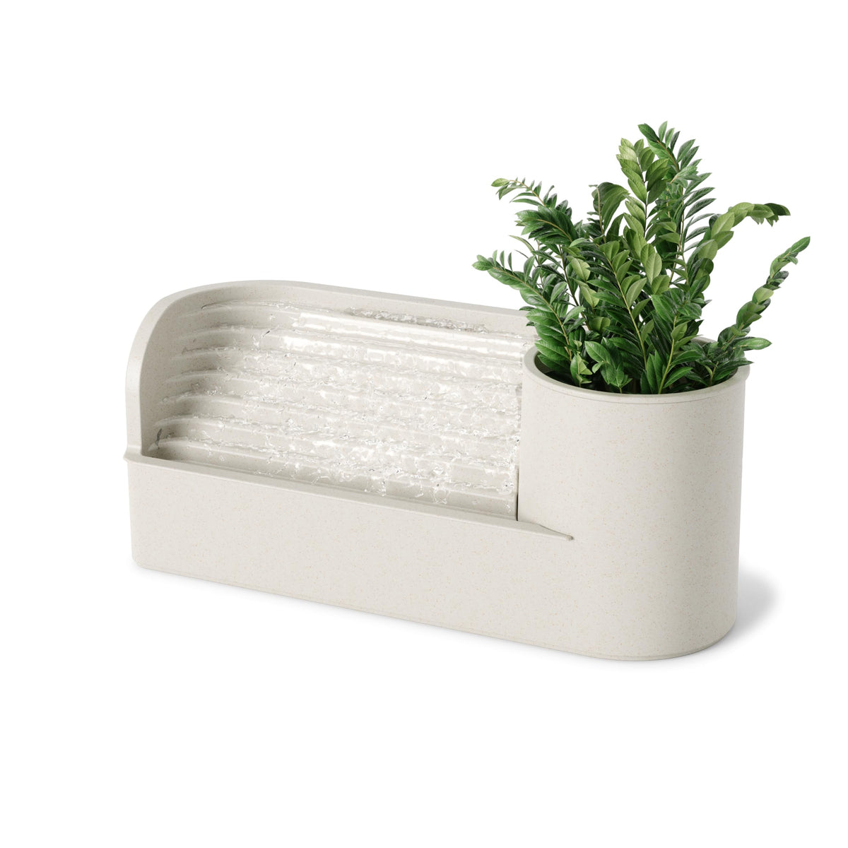 Umbra Stream fountain on desk creates calming ambiance and organized workspace.