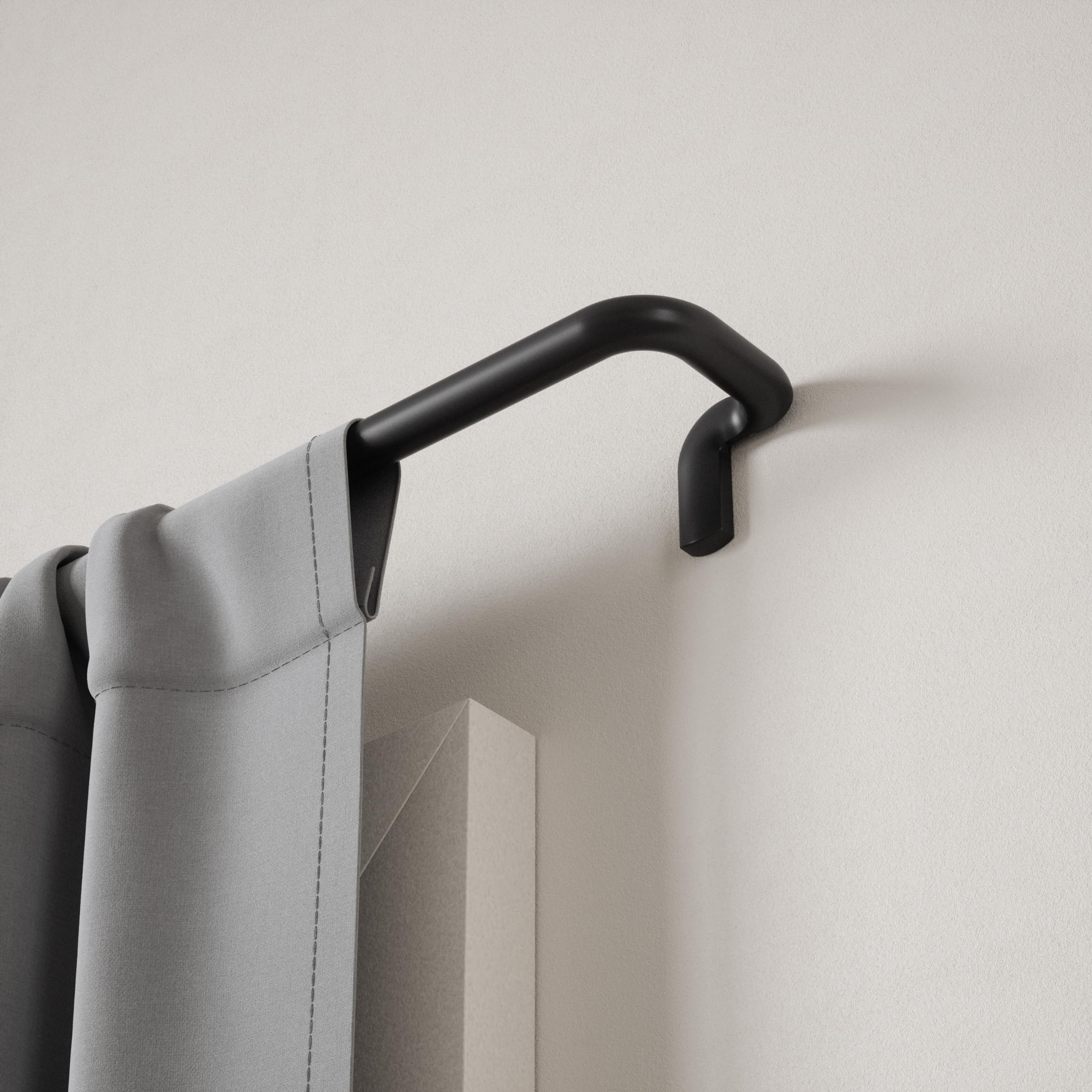 Umbra Twilight supports multiple curtain styles including grommet and rod pocket.