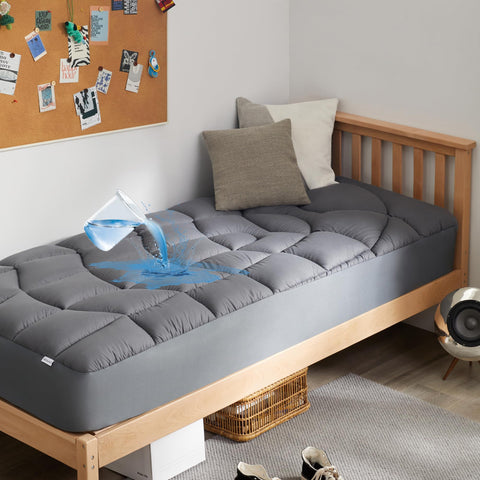 Unikome twin mattress protector top with soft microfiber for cooler nights.