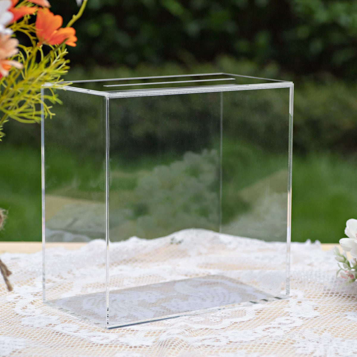 UNIQOOO clear acrylic card box with slot for weddings and events on a reception table