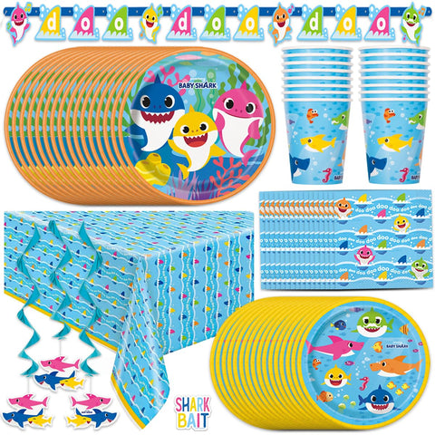 Unique Baby Shark banner over the gift table adds ocean-themed celebration.