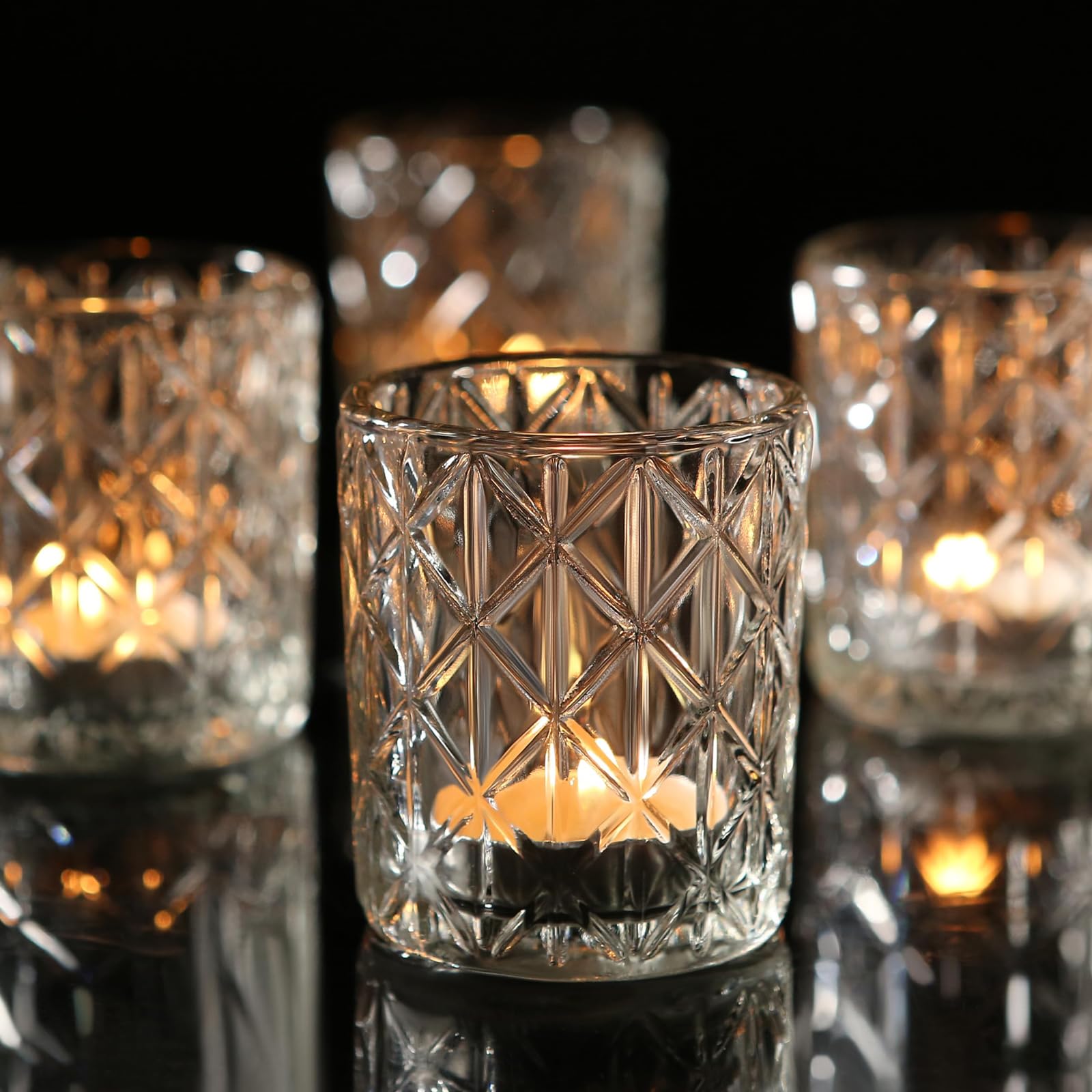 Uniteland 36-pack votive holders in clear glass enhance ambient lighting for table settings.