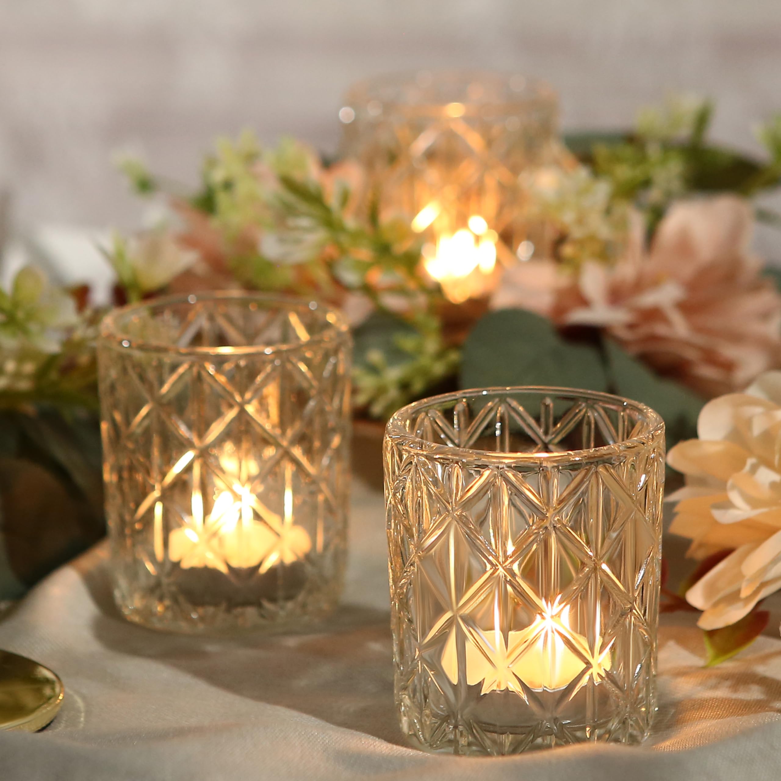 Uniteland clear votive holders complement various room settings with timeless elegance.
