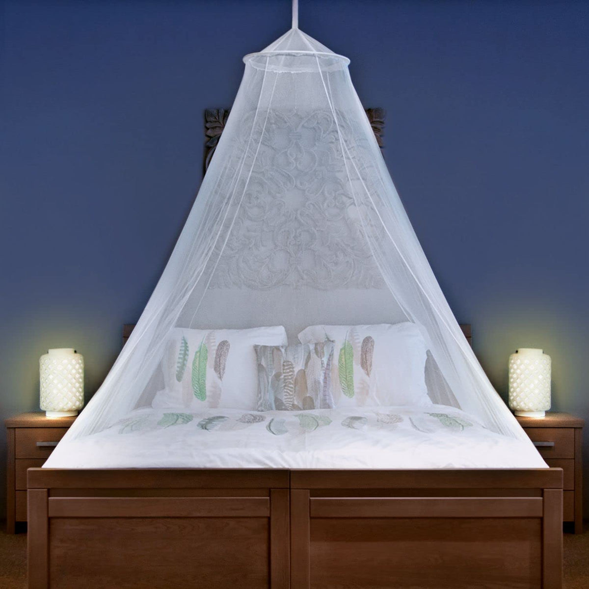 Universal Backpackers mosquito net in setup over a bed for travel protection.