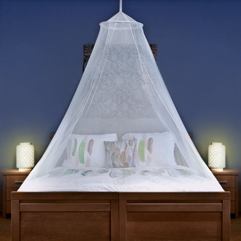 Universal Backpackers mosquito net in setup over a bed for travel protection.