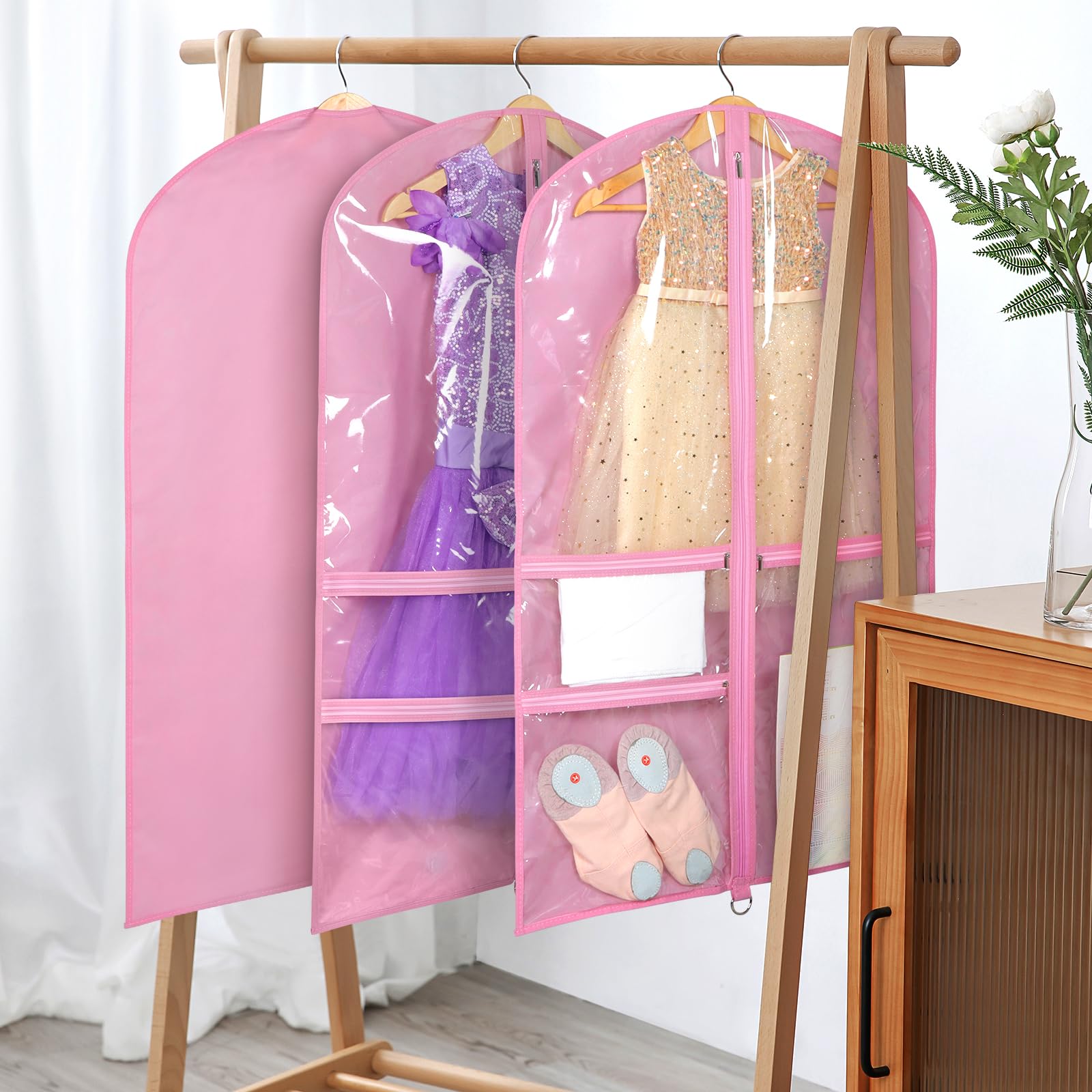 Univivi pink bag hanging in closet demonstrates convenient hanging during travel.