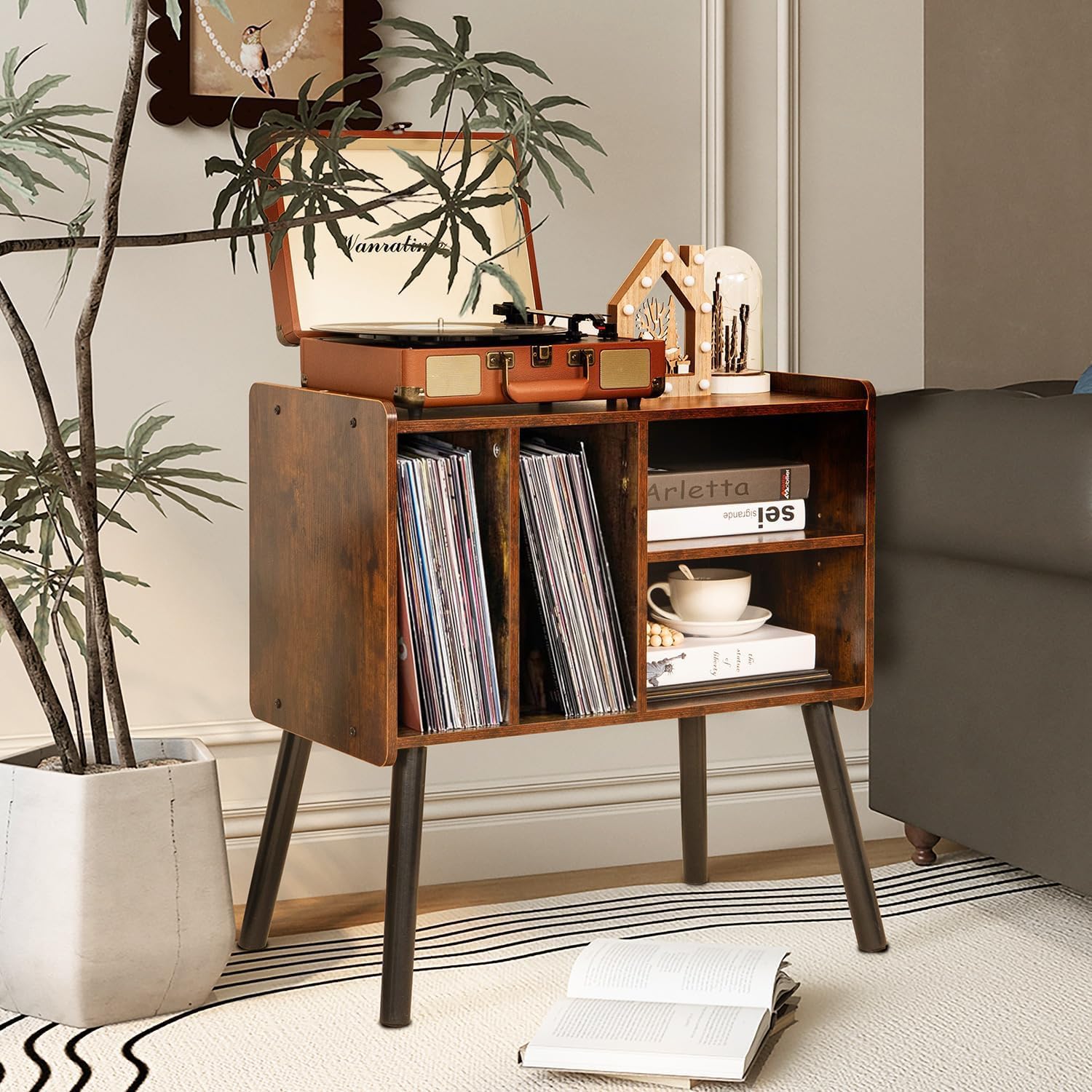 UODERS record player table used as nightstand in a cozy bedroom