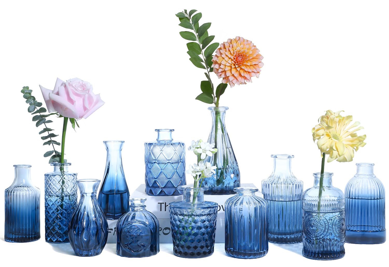 UPBUD Glass Blue Bud Vases show navy blue glass with a textured finish, ideal for elegant centerpieces.