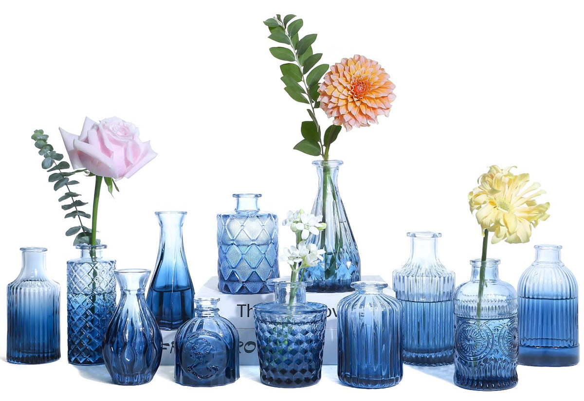 UPBUD Glass Blue Bud Vases show navy blue glass with a textured finish, ideal for elegant centerpieces.