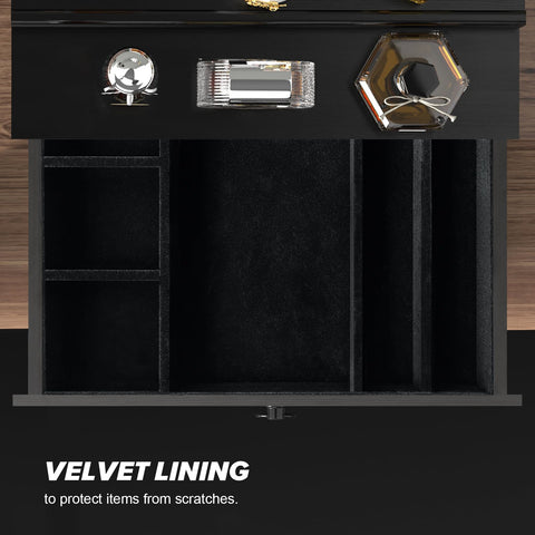 Bottom drawer divider stores accessories like watches and jewelry securely.
