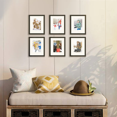 Upsimples 8x10 frame set on table for easy swapping and display.