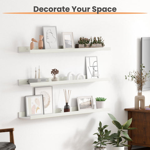 Upsimples shelf displaying plants and frames for decor appeal.