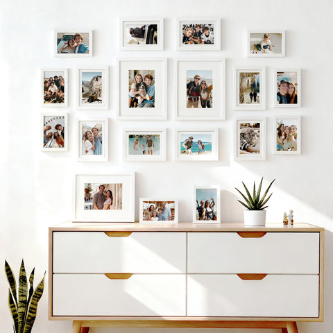 upsimples white frames shown on a tabletop and mounted on a wall for versatility.