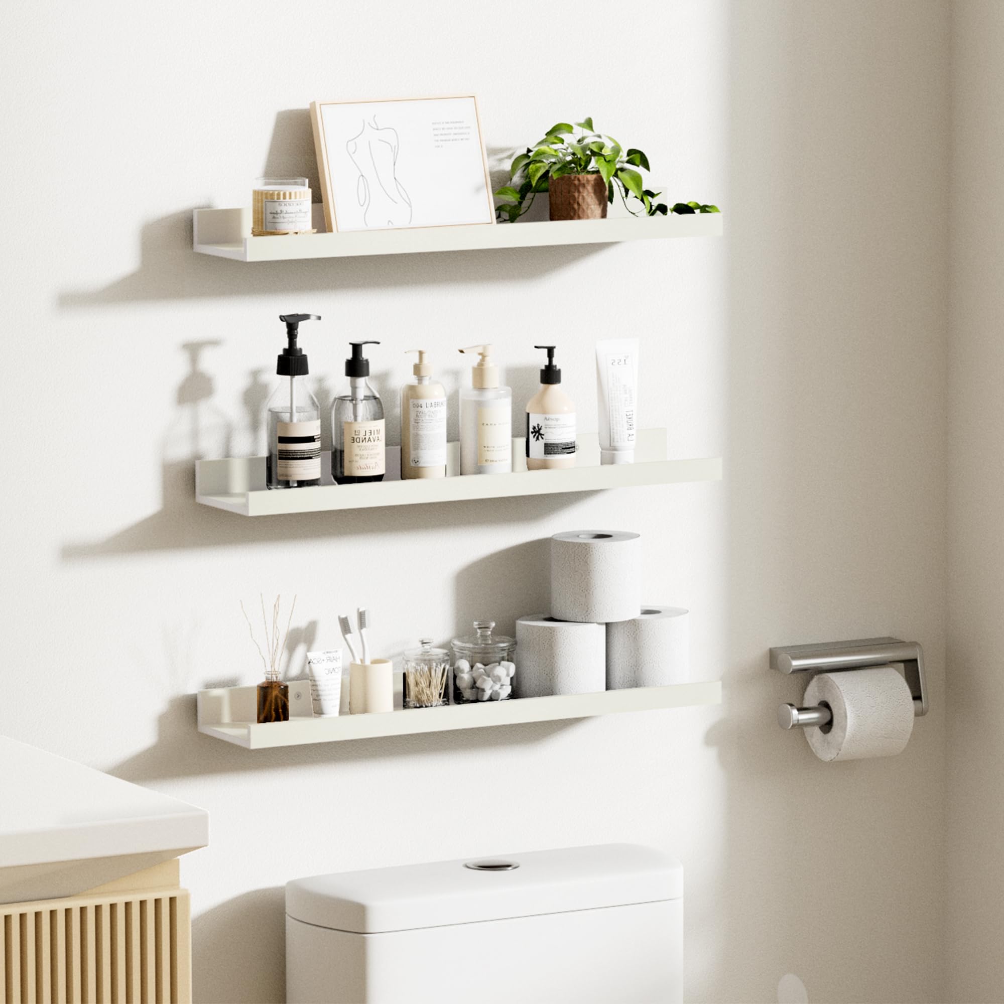 Upsimples white floating shelves displaying plants and frames with ease