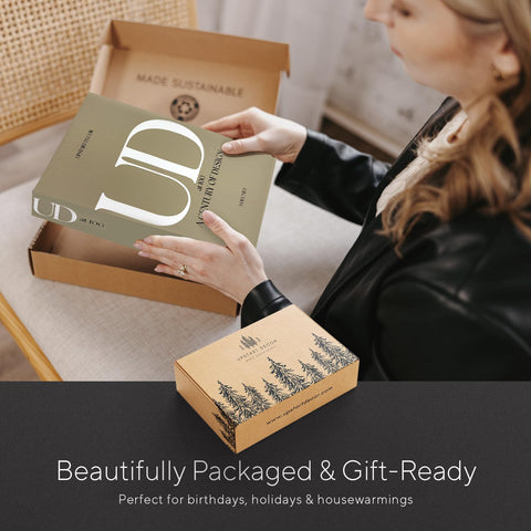 Upstart Decor gift packaging featuring the three-book decorative set.