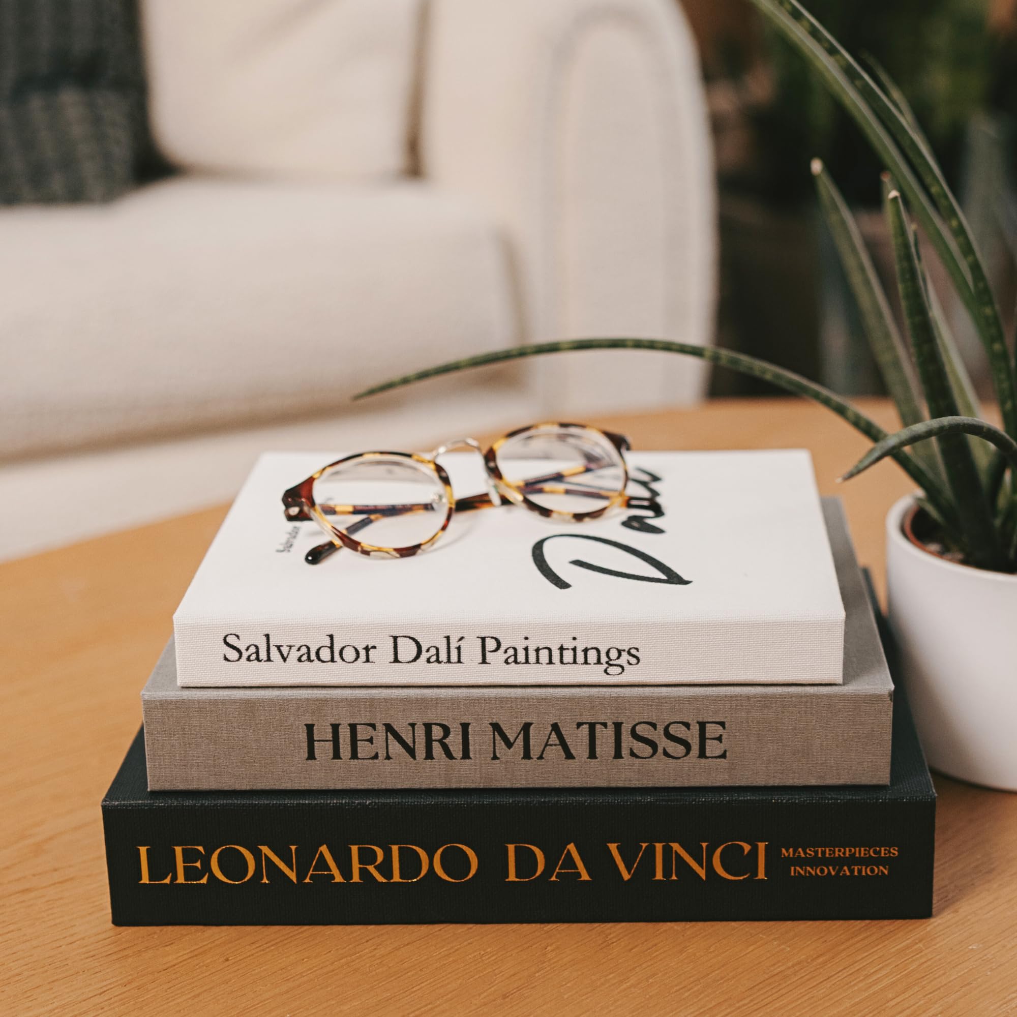 Upstart Decor decorative books add depth without clutter on mantles and consoles