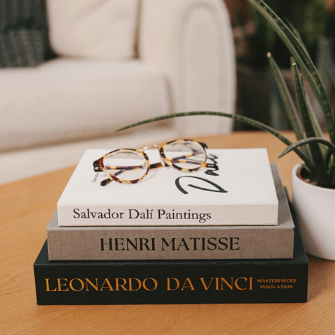 Upstart Decor decorative books add depth without clutter on mantles and consoles