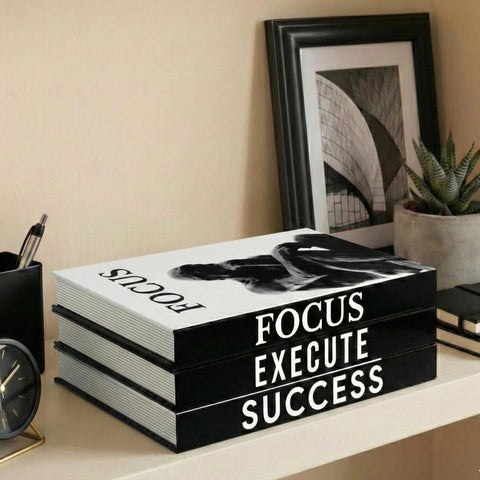 Upstart Decor motivational faux books on a shelf add minimalist desk styling.