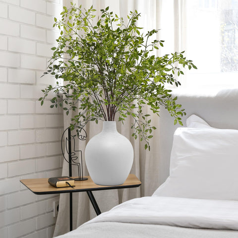 Uqueeten floor-vase stems offer height and drama for tall displays