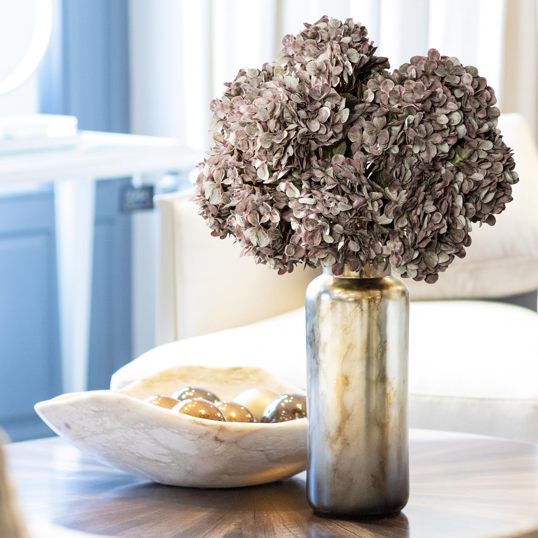Uqueeten hydrangea exterior plastic stems with interior wire for durable shaping.