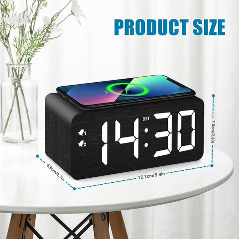 URAYCO bedside desk setup showing the clock's integration into a living space